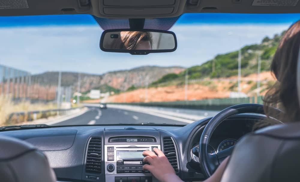 Woman driving on the highway.